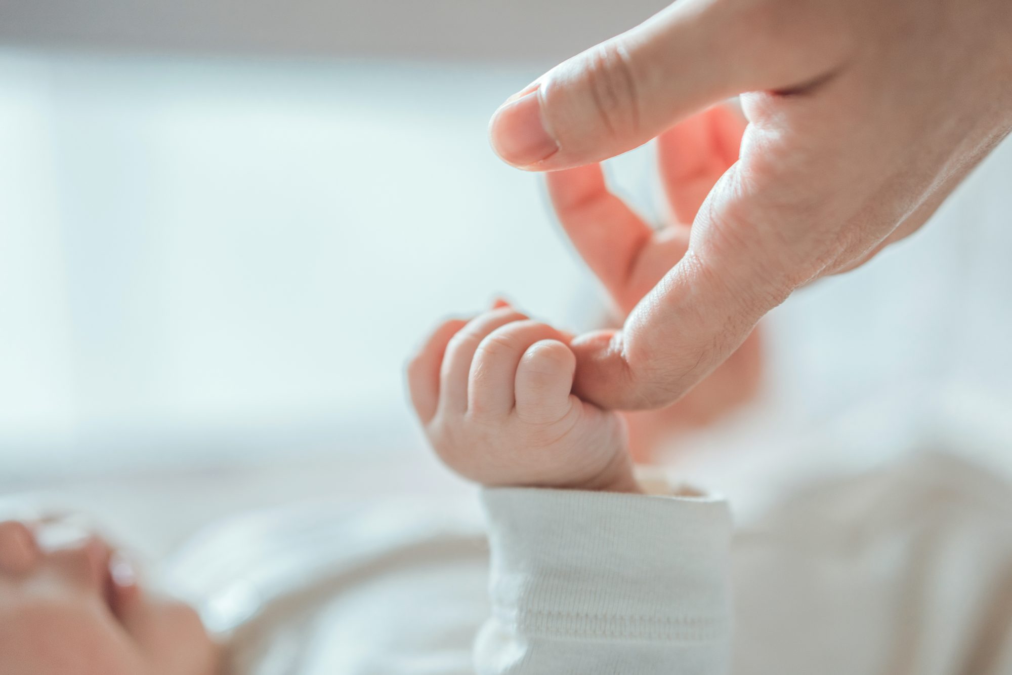 Mother holding newborn baby