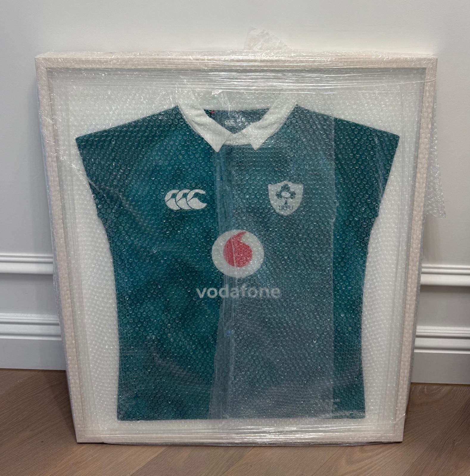 Framed green Ireland rugby jersey, signed, marking Jack Conan's 60th cap