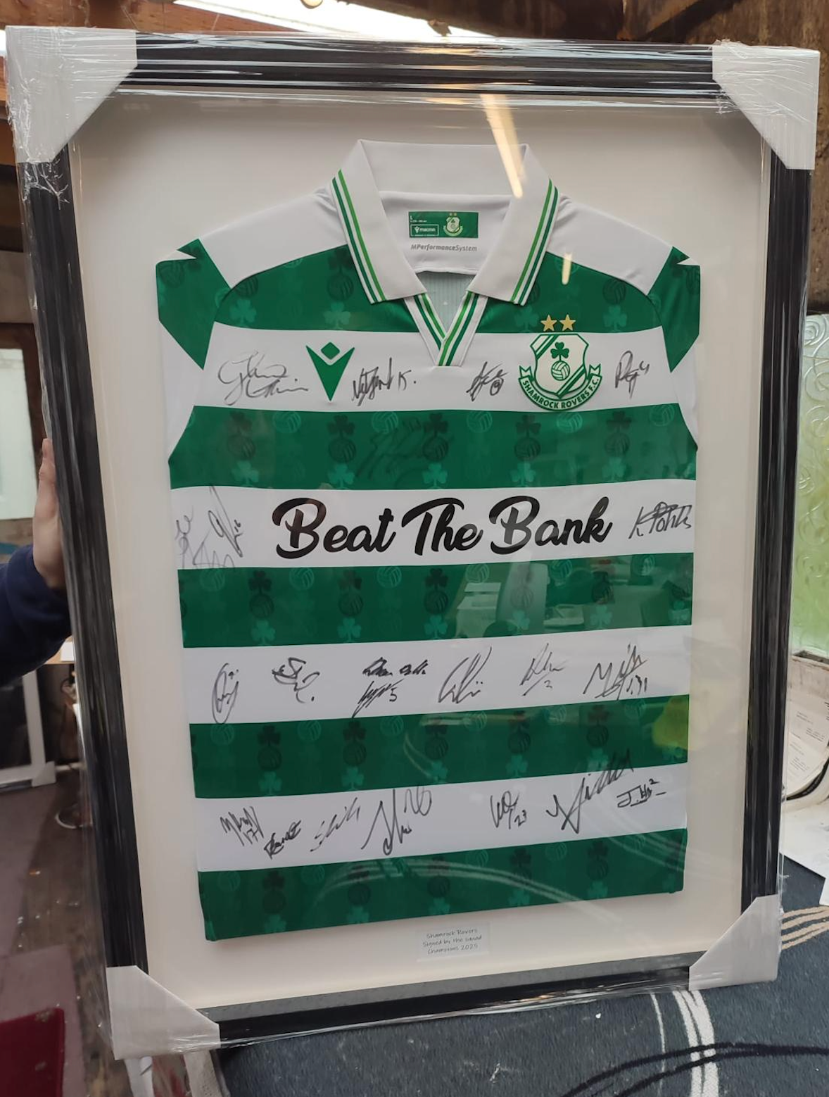 Shamrock Rovers green and white hooped jersey signed by the squad